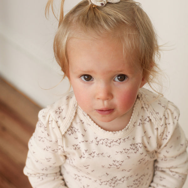 Pouf Onesie